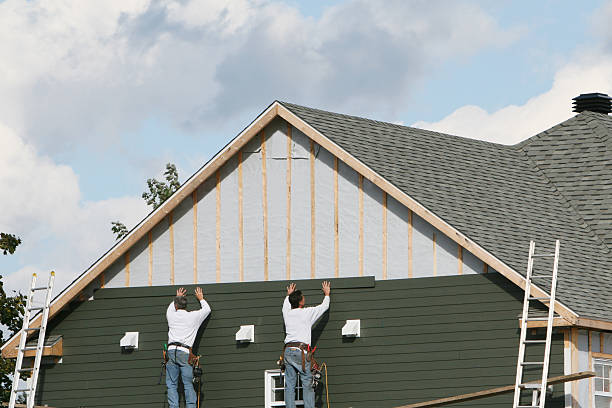 Professional Storm Damage Siding Repair technician working in Orangeburg, NY